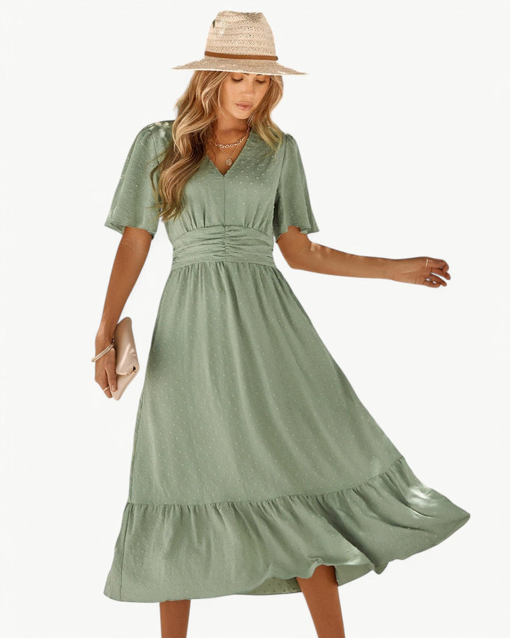 Renée – Robe longue à encolure en V